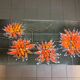 Vintage coffee table ceramic tray decorating orange flowers on grey background