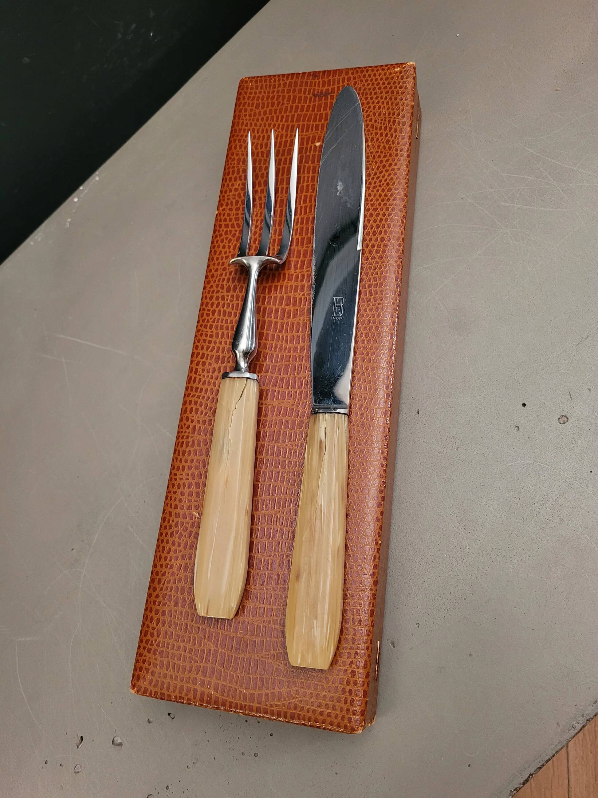 Cutlery made of horn and stainless steel