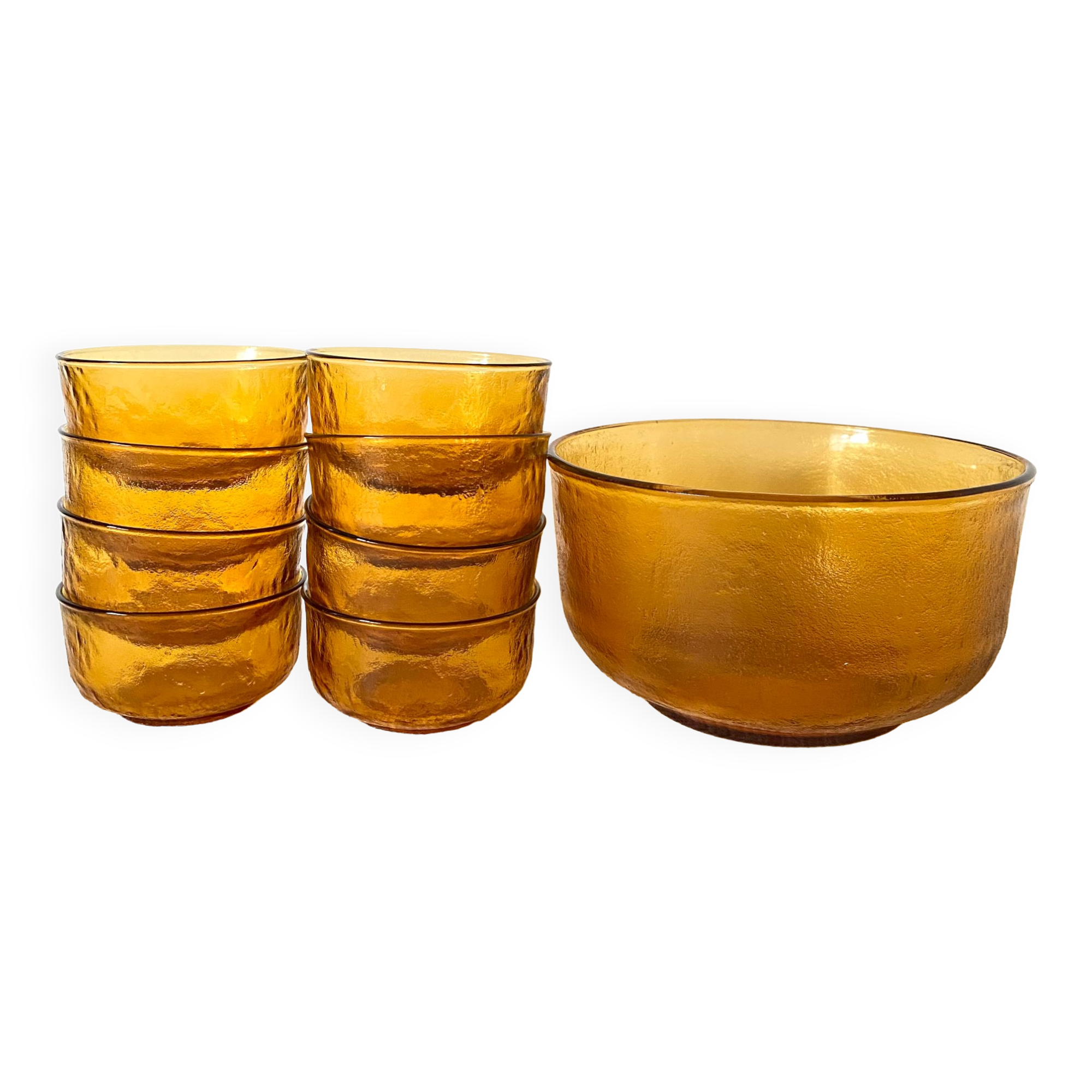 Salad bowl and bowls in amber glass, 70s