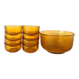 Salad bowl and bowls in amber glass, 70s