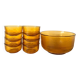 Salad bowl and bowls in amber glass, 70s