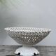 White woven ceramic fruit bowl
