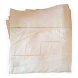 White sheet: reverse with embroidery and handmade stitching.