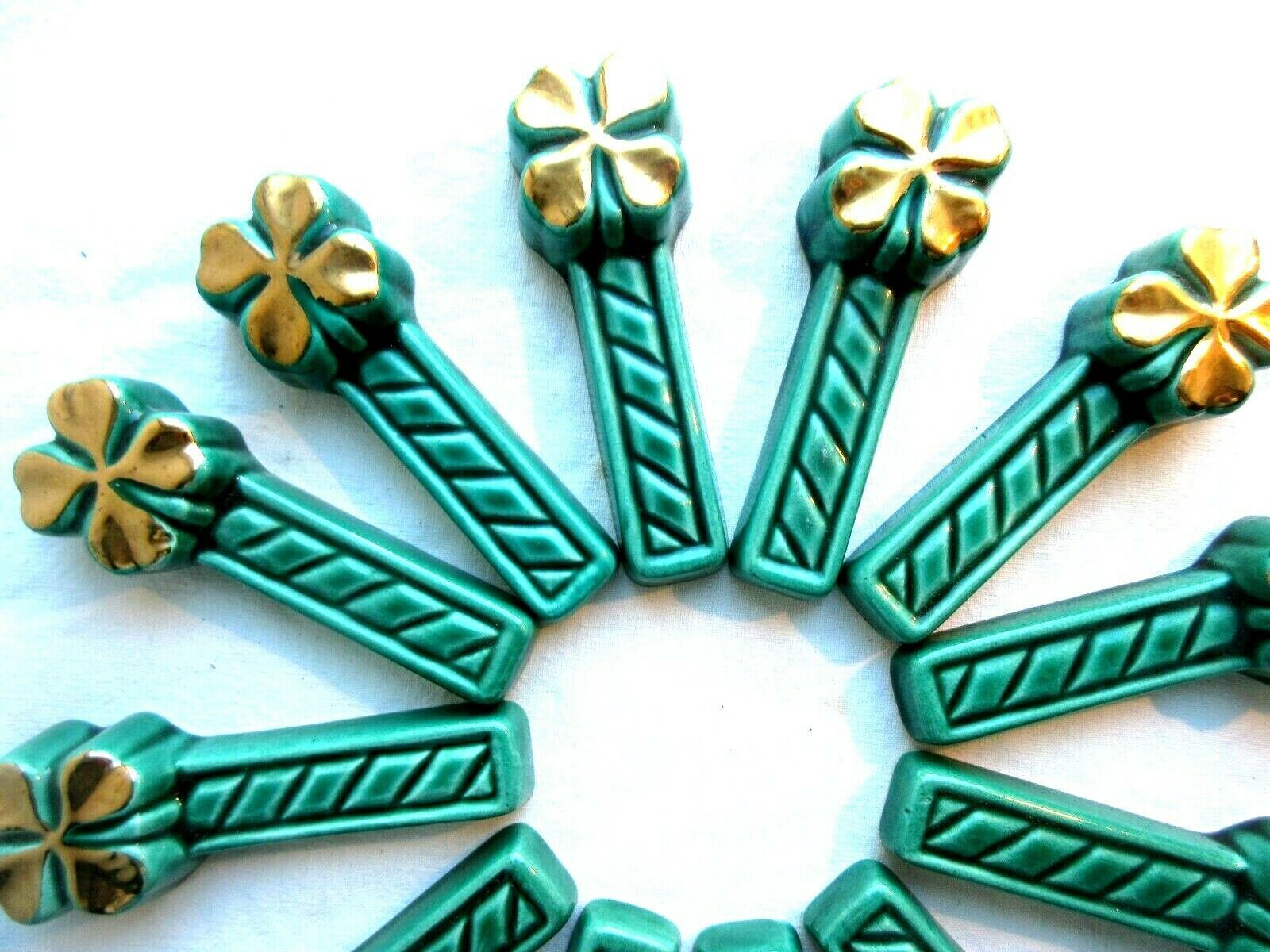 Set of knife holders, 12 art-deco knife rests, 4-leaf clover gold