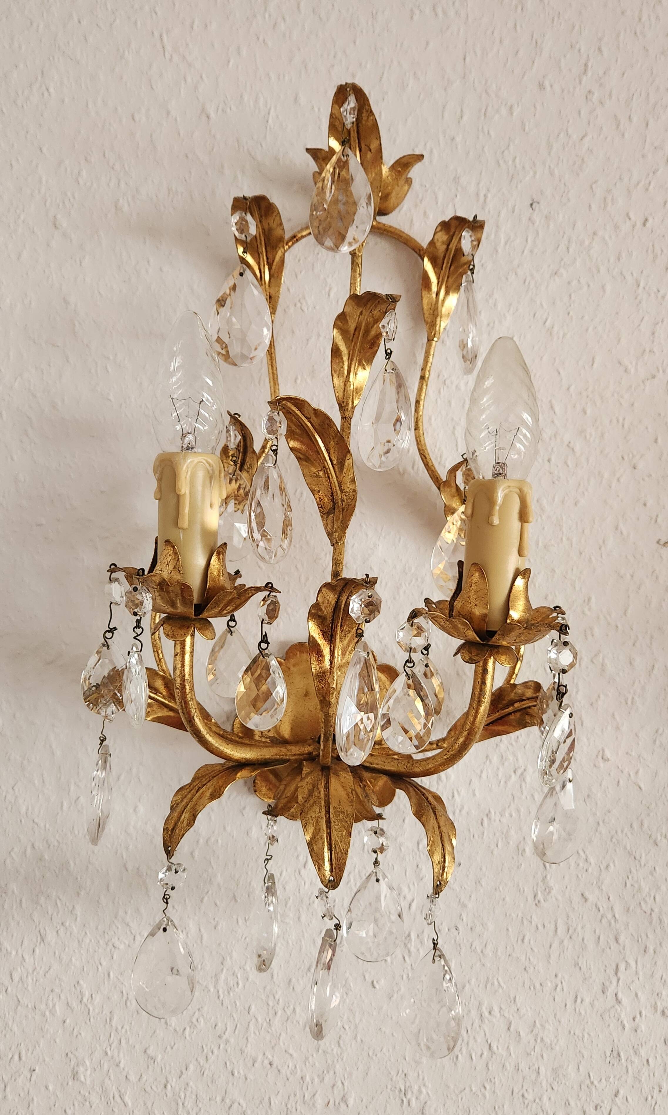 Hand-forged wall lamp gilded with gold leaf and crystals, Italy