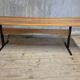Vintage rectangular coffee table with a wooden top and black metal base, 1960s.