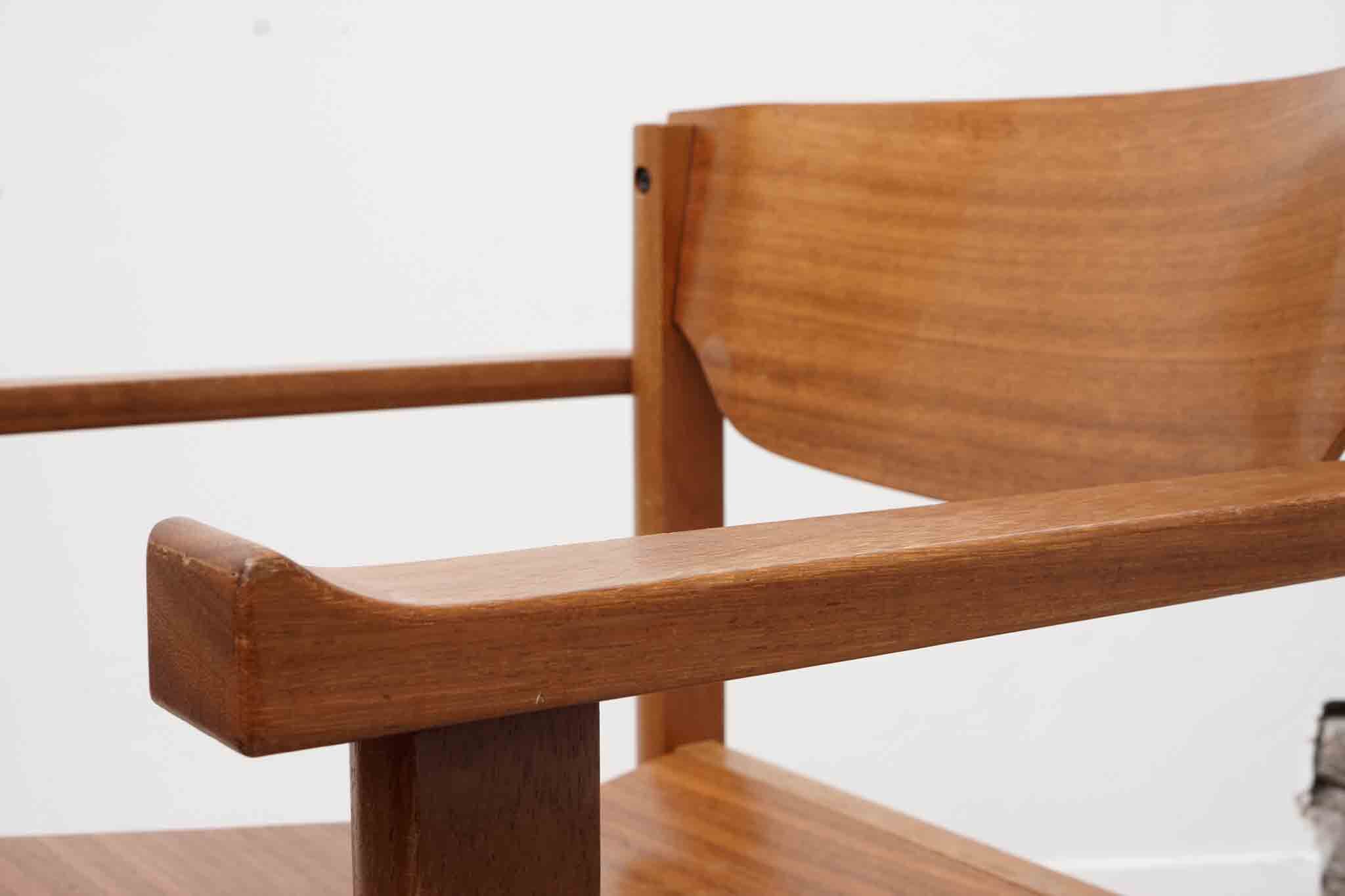 Vintage stackable wooden chair with armrests