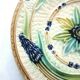 Art Deco dabbling plate, muscaris and a butterfly.