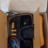 Vintage orange telic phone with ptt dial