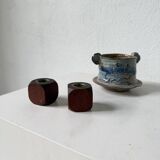 Pair of 1960s teak and brass "dice" candlesticks