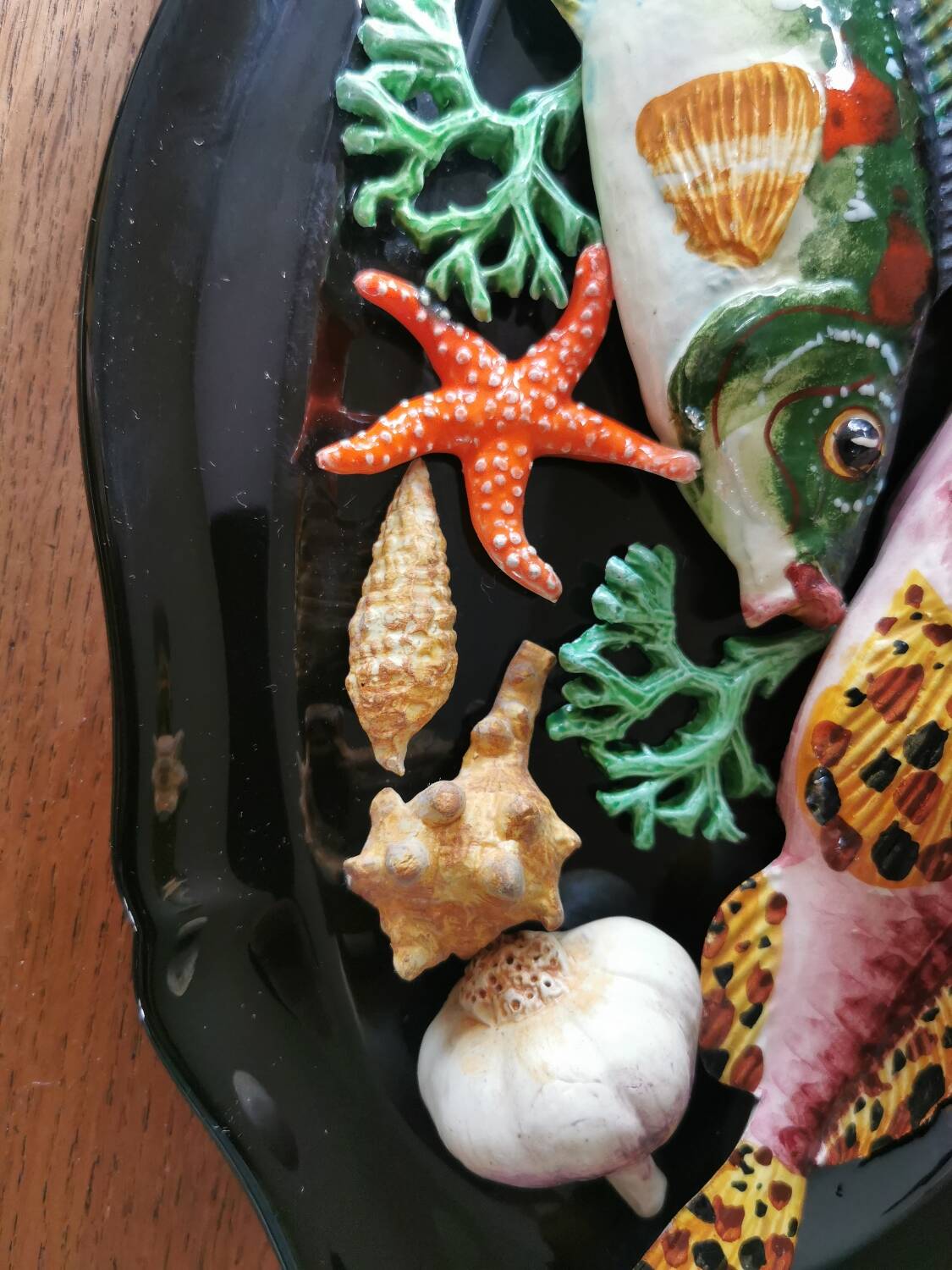 Vintage barbotine dish with fish decoration in relief