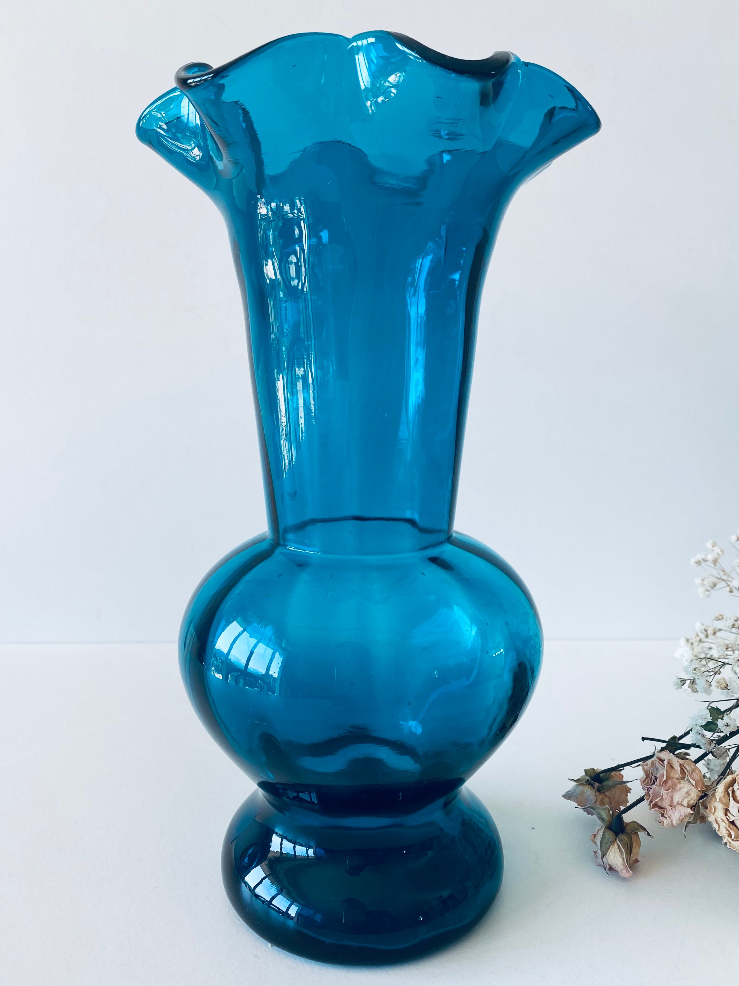 Old blue duck vase with collar