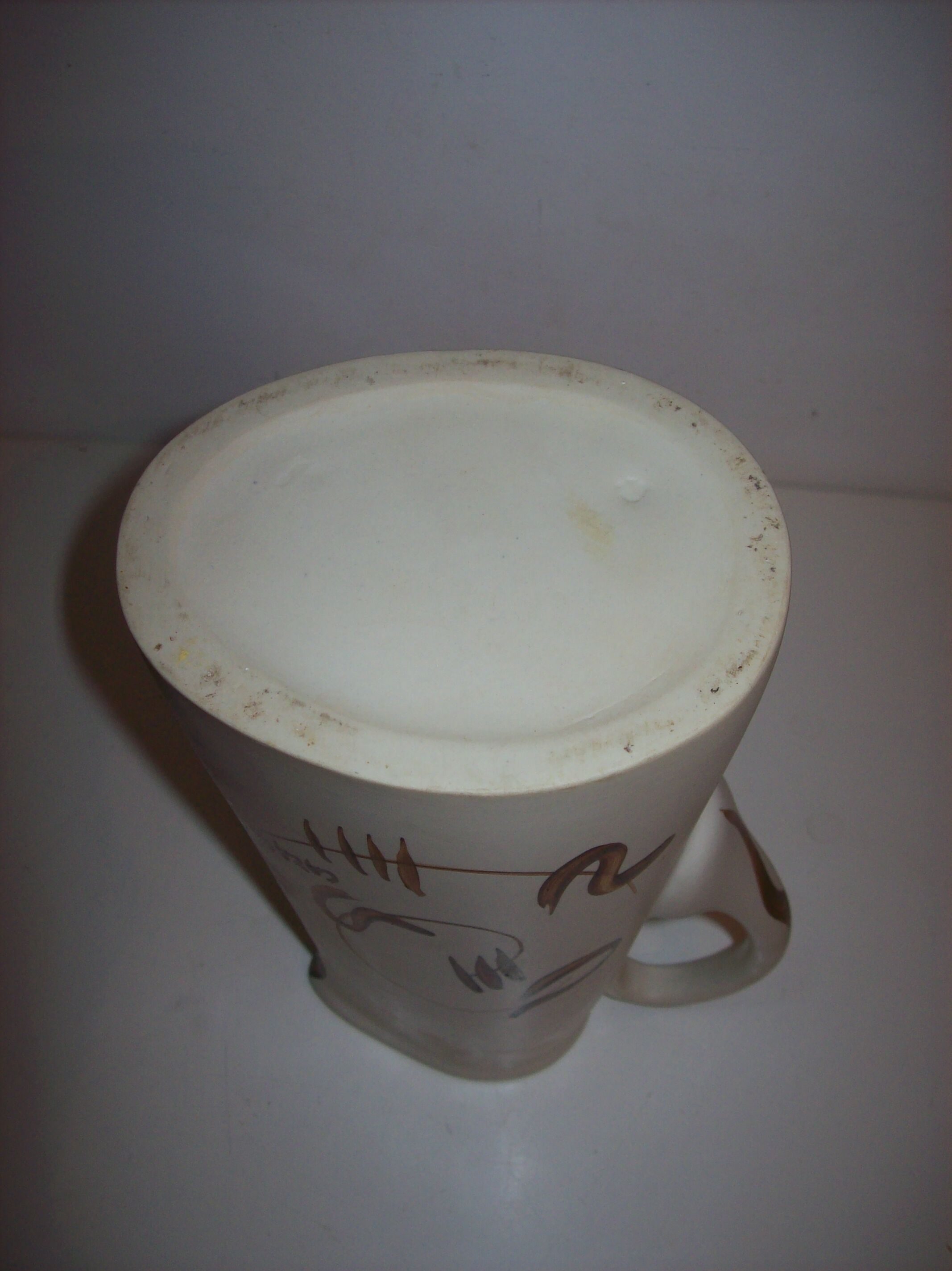 Ceramic pitcher with hand-painted decoration