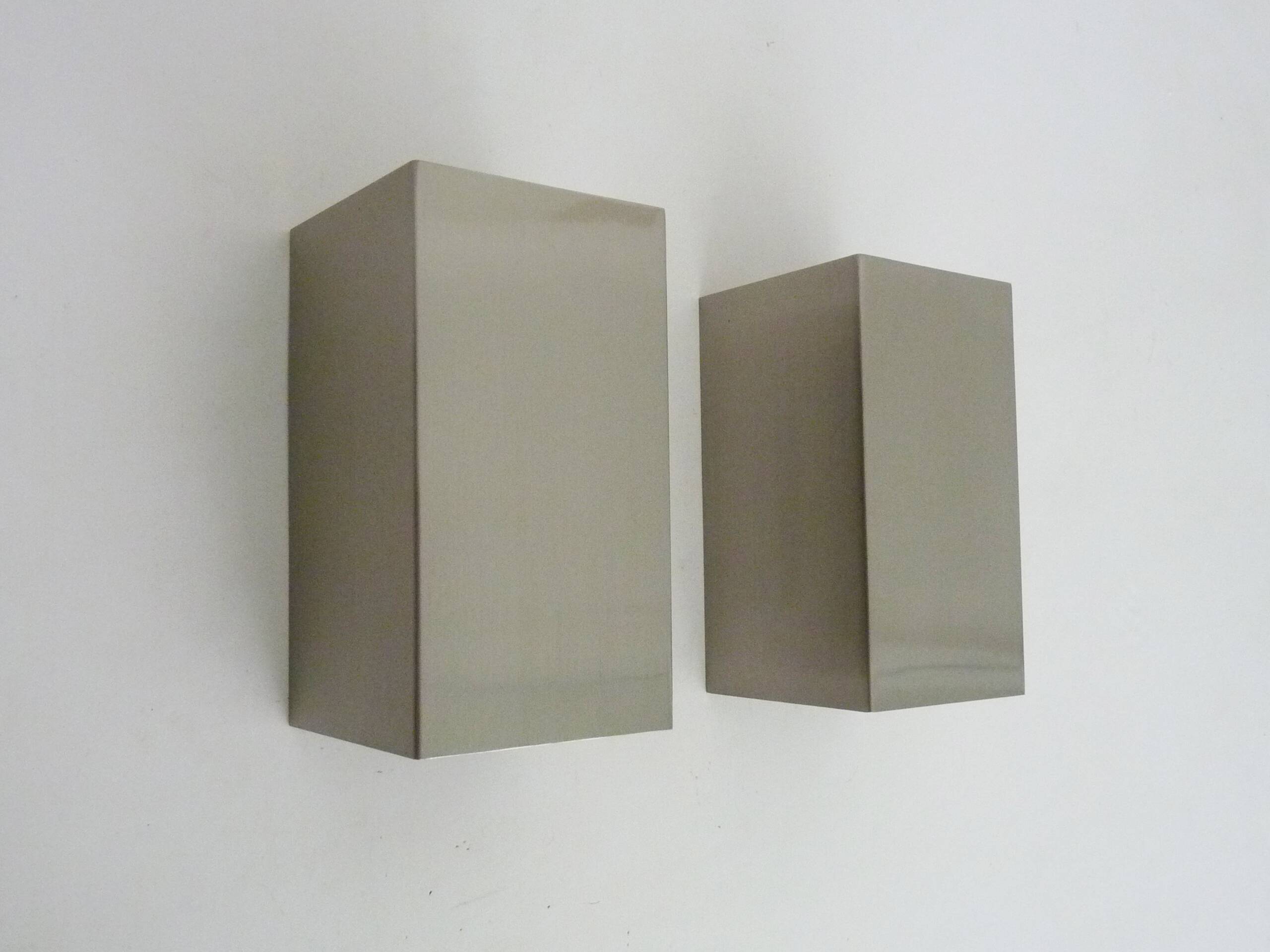 Pair of vintage chrome wall lights in Massive stainless steel