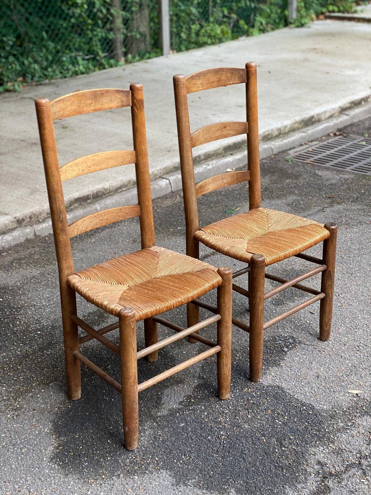 2 solid wood chairs in dark oak and high elephant straw