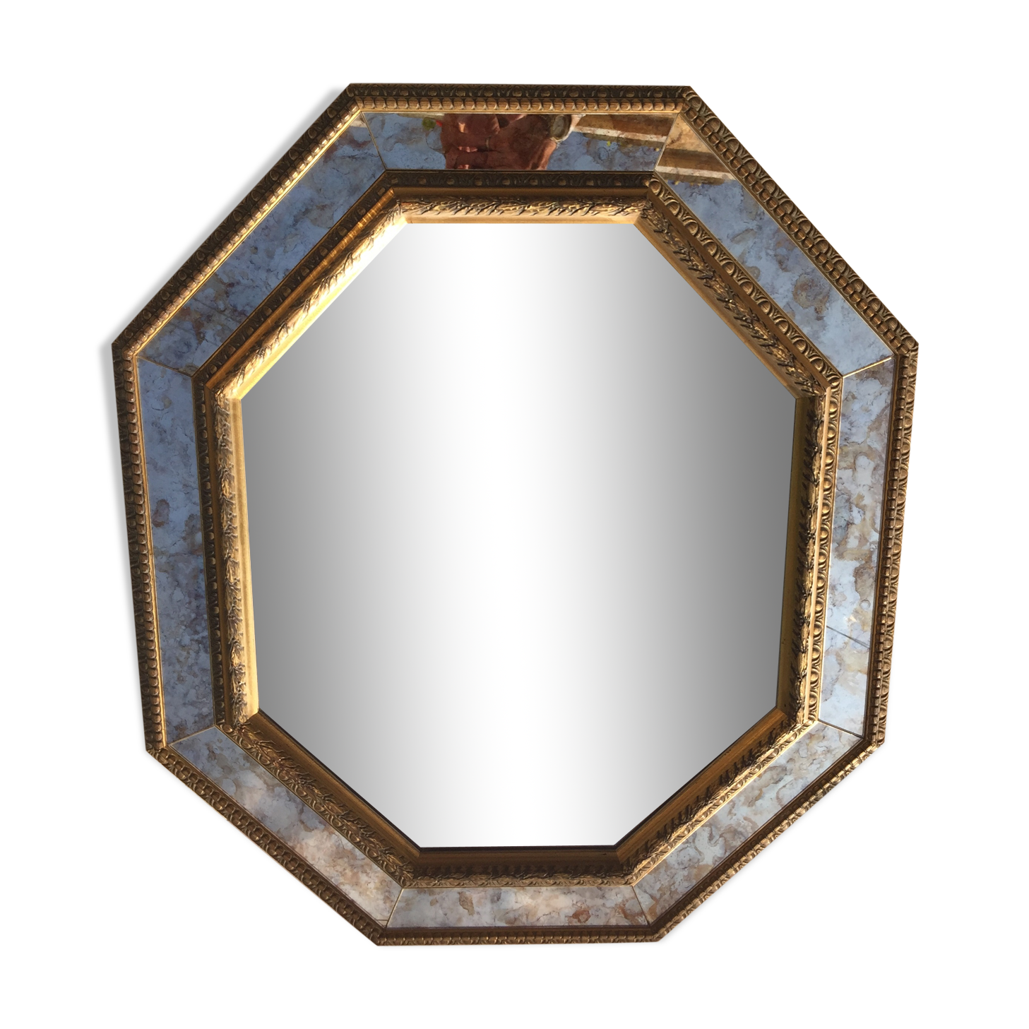Antique mirror in gilded wood with beveled octagonal shape 72 x 63 cm
