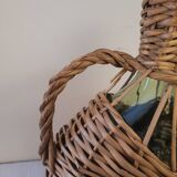 Green glass carafe with wicker covering – 2 litres – 1960s–1970s