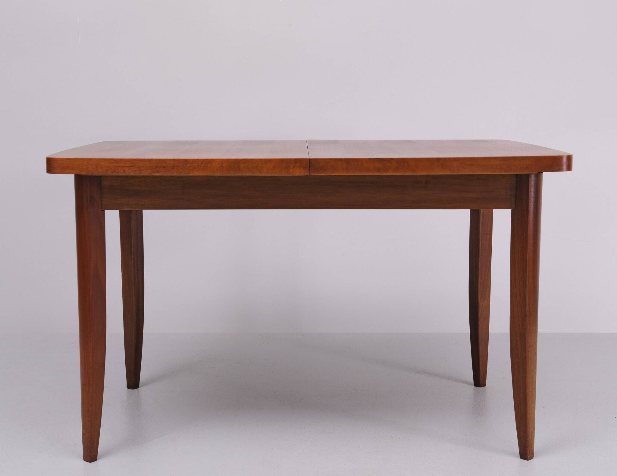 Extendable dining table in walnut wood by Jindrich Halabala 1960