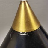 Cone pendant produced by Danish Lyfa in beautiful black lacquer with perforated shade and brass top.
