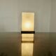 Pair of Arlus wall lights in perspex, gilded brass and lacquered metal, 1960s