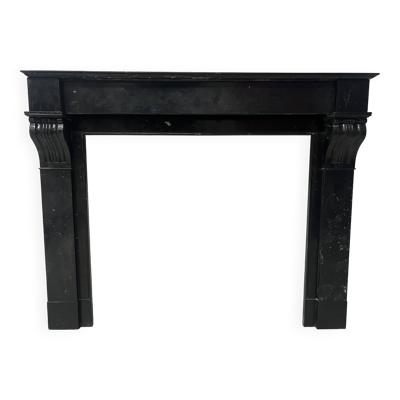 Cheminée époque Napoléon III a corbeau en marbre noir . XIX siècle .