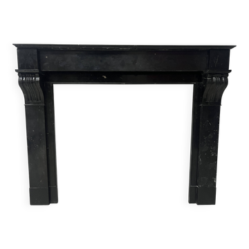 Napoleon III period fireplace with a black marble corbel. 19th century.