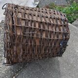Brown woven vintage Hungarian wicker basket, reinforced edge and metal handles, 1940s.