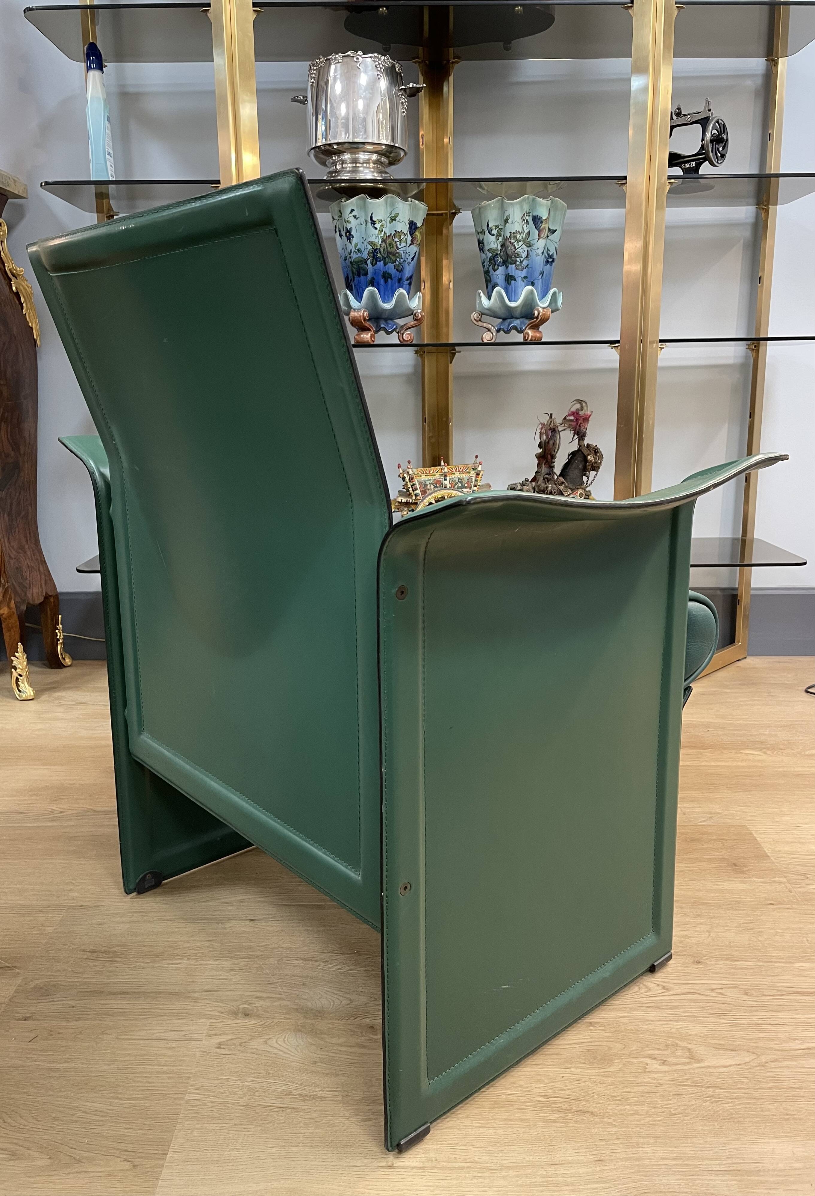 Pair of green leather armchairs from the 70s
