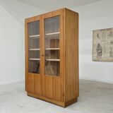 Oak glass-fronted school cabinet 1960
