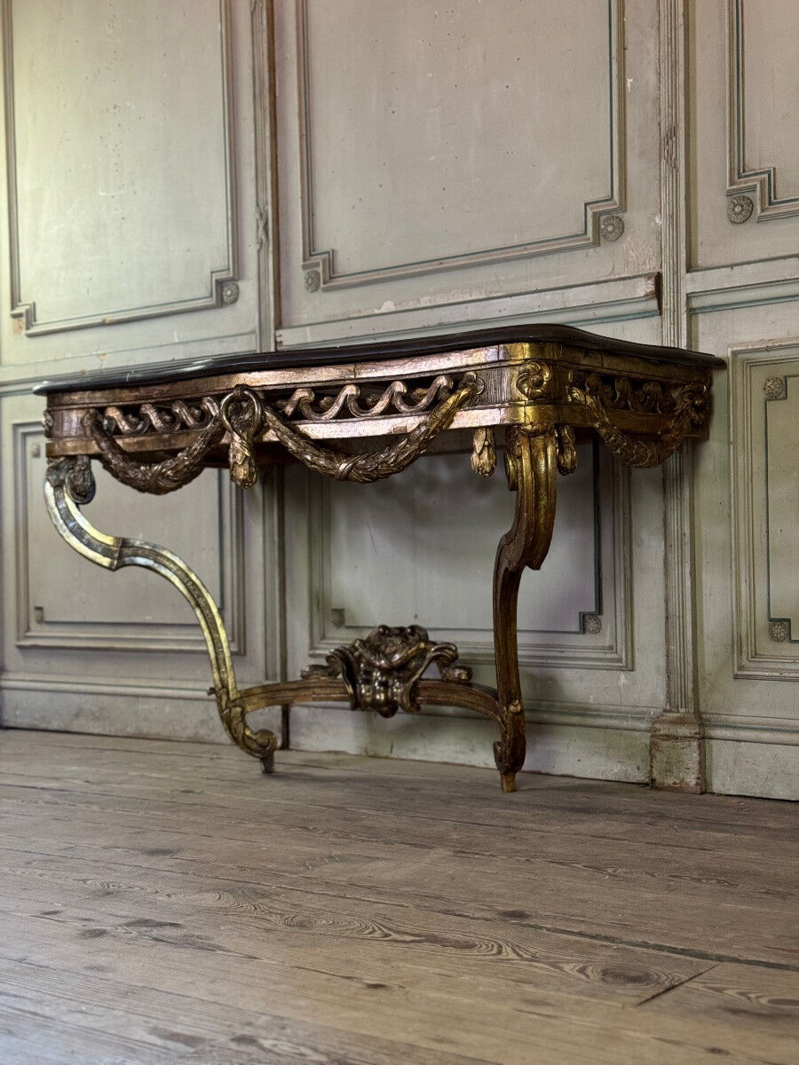 Transitional console in carved and gilded wood, France, 18th century