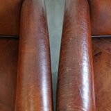 Vintage set of 4 sheepskin leather dining chairs on castors