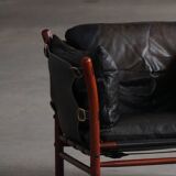 "Lounge chair 'Ilona' by Arne Norell in stained beech and leather, mid-20th century."