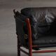 "Lounge chair 'Ilona' by Arne Norell in stained beech and leather, mid-20th century."