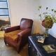 Old studded leather club chair 1930-1930