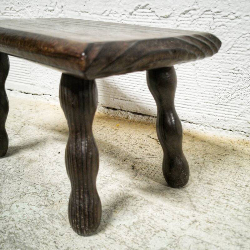 Turned wooden footrest