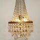 1900s Brass and Crystal Cascade Chandelier