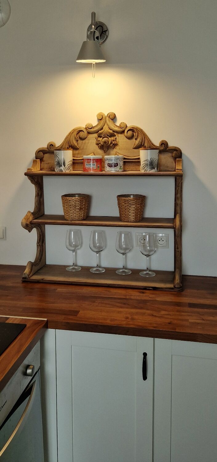 Old wall shelf carved in walnut