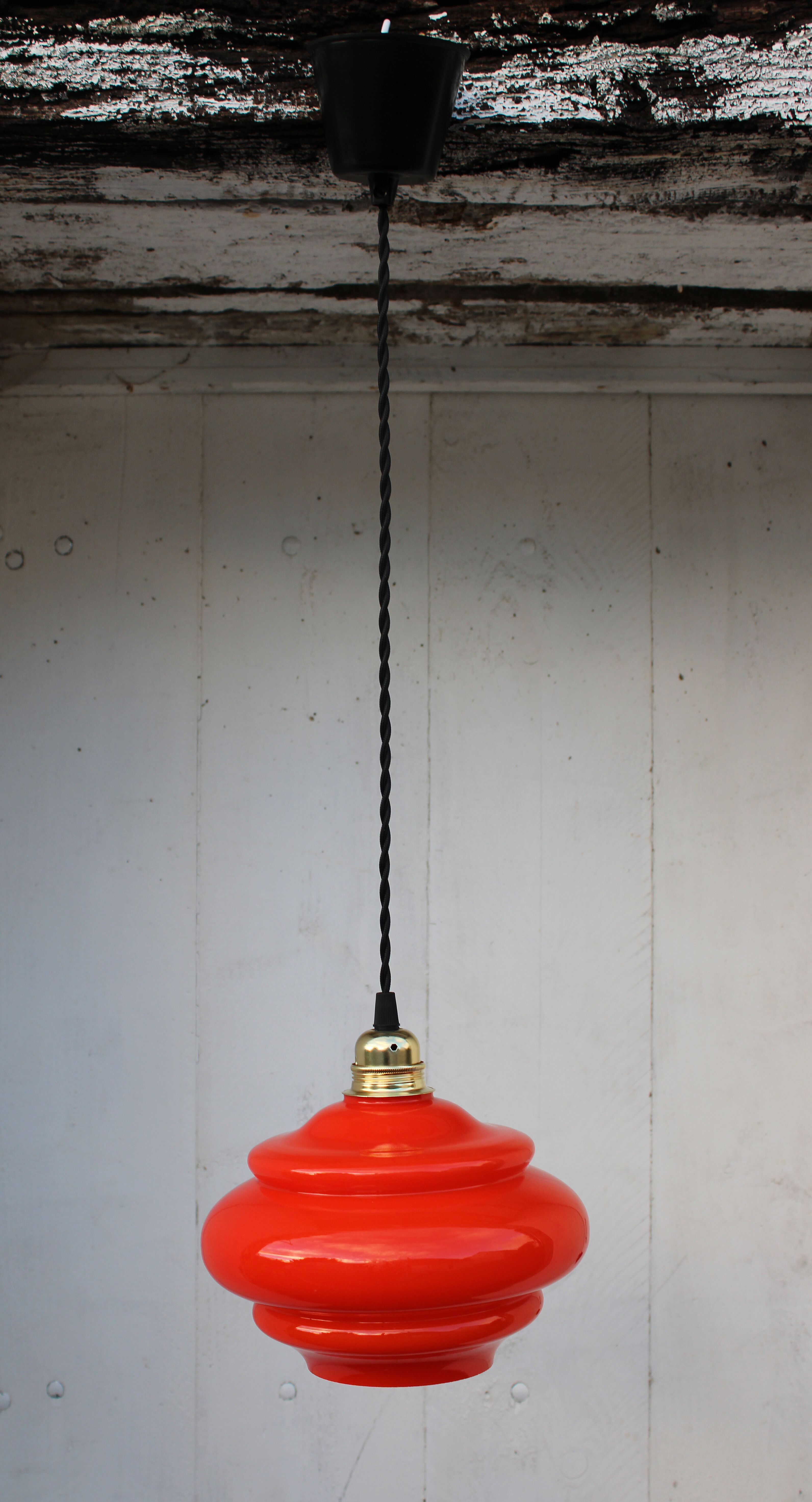 Suspension in orange opaline