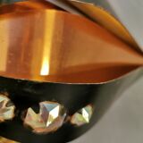 Hanging lamp in thin metal pieces, copper colored and black with prisms.