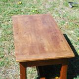 Rustic old wooden coffee table with crossbar and drawer