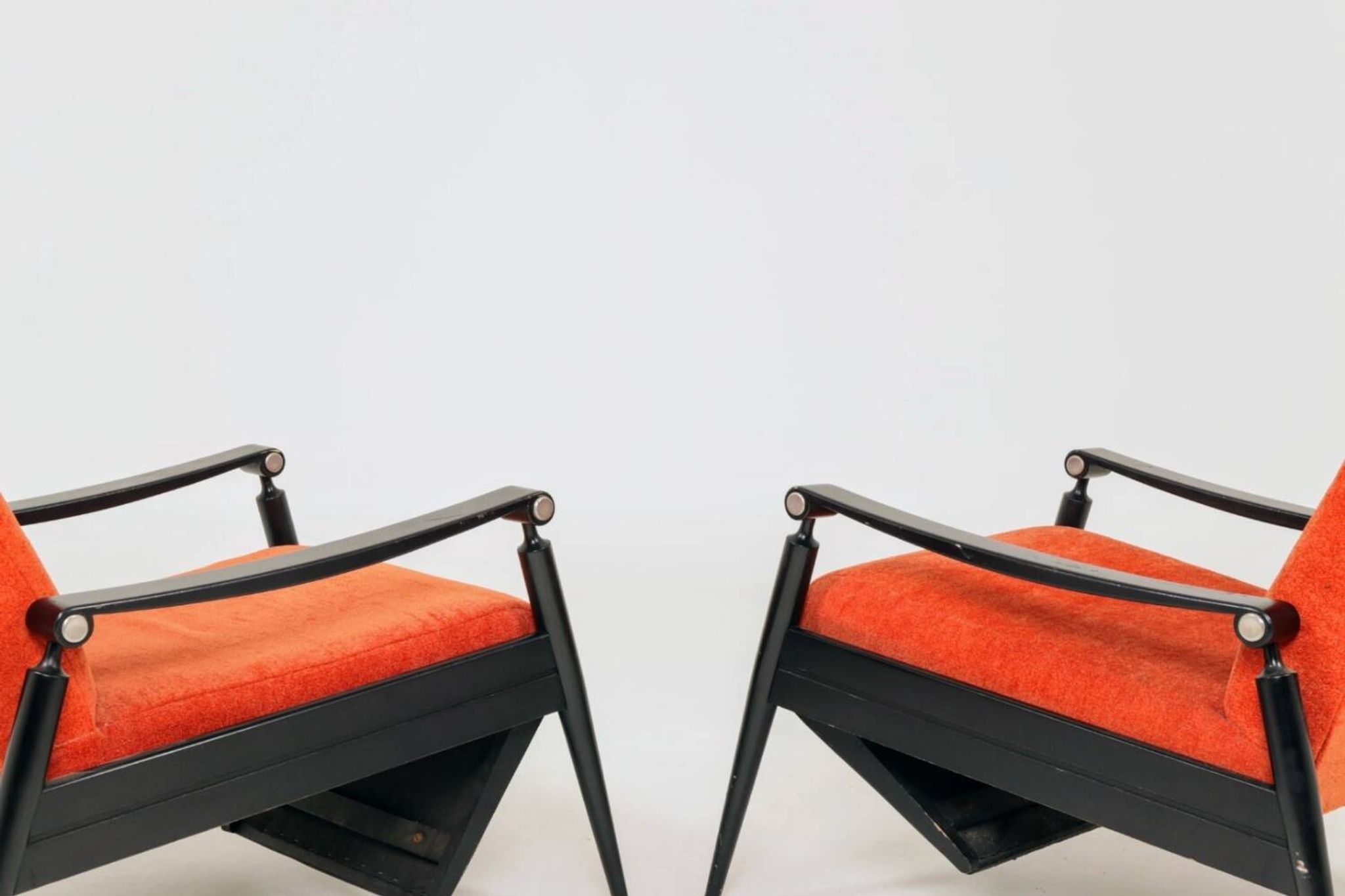 Pair of vintage armchairs in burnt orange, MCM design from the 1960s.