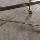 Rolling coffee table in vintage gilded bronze