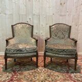 Paire de fauteuils bergères de style Louis XVI