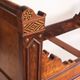 Bed made of solid walnut with marquetry details. France, 1930s.