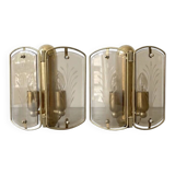 Pair of brass and smoked glass wall lights