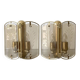 Pair of brass and smoked glass wall lights