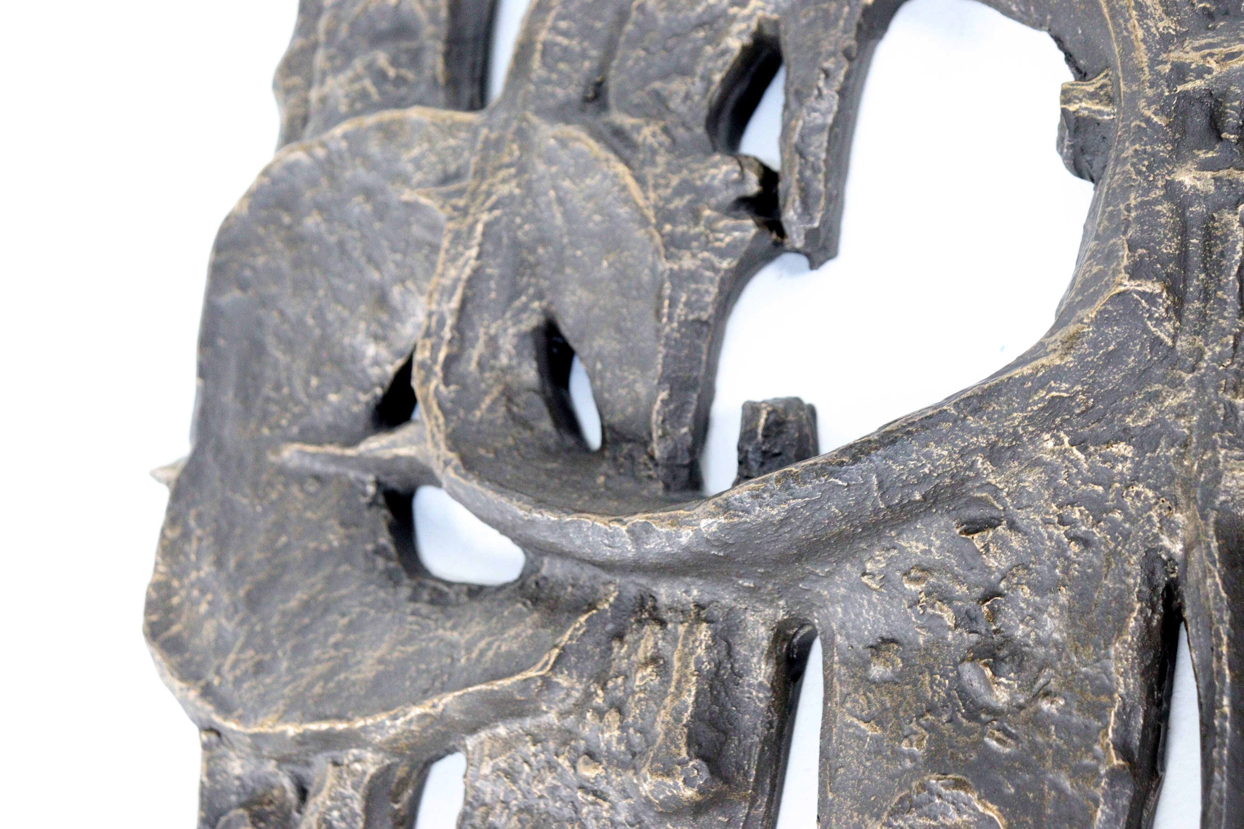 Brutalist wall sculpture - Gatekeepers