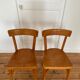 Pair of Baumann bistro chairs