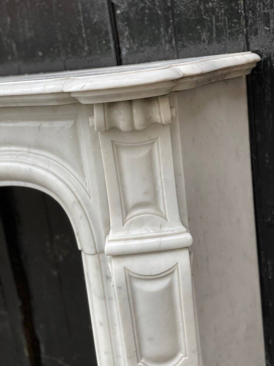 Louis XV style fireplace in Carrara marble