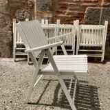 Five wooden garden armchairs